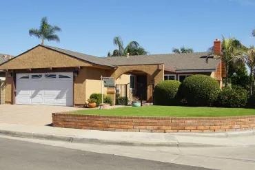 Single story brick house with garage