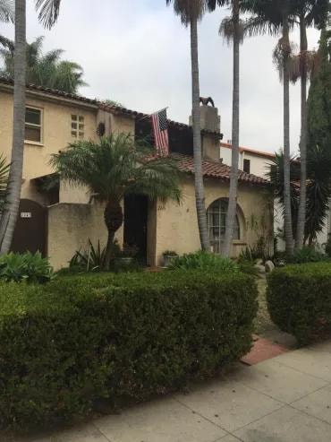 Spanish colonial house with palm trees